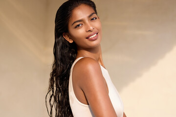 Woman Hair Care Beauty Glow: Portrait Of A Smiling Woman With Wet Hair, Radiating Confidence And Natural Elegance In Sunlight. Skin Care, Healthy Hair, Natural Beauty, Relaxation Concept.