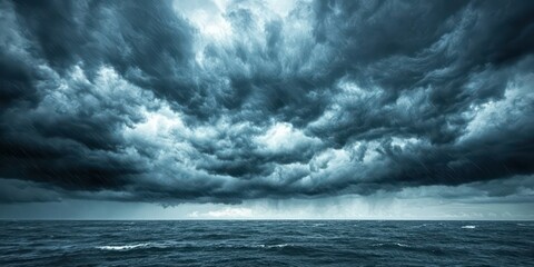 Fototapeta premium Dark, thick storm clouds gathering over a vast plain, creating a sense of impending rain and thunder.