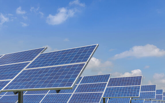 Close up rows array of Solar panels or solar cells or photovoltaics in solar power station alternative clean renewable energy efficiency sustainable