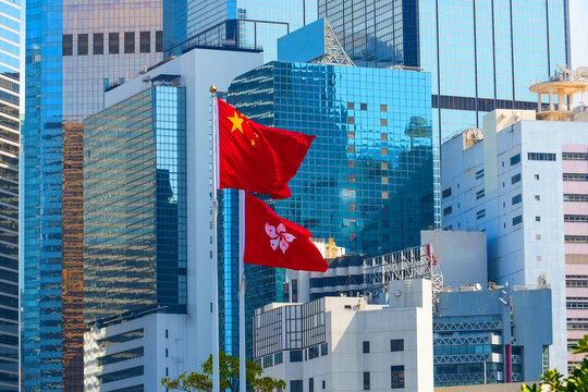 Flag Republic of China and Hong Kong Special Administrative region, the background of city buildings.