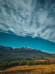 Fototapeta premium kanasi lake landscape or mountain view, scenery of mountain in China, travel destination or tour tourism, xinjiang, majestic panorama nature view. destination, blue sky, hill top, calmness.