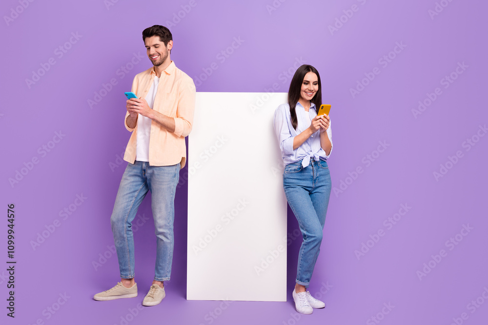 Poster full body photo of two positive people use smart phone huge empty space banner isolated on violet co