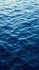 Obraz premium Abstract texture of water with ripples and light reflections, background, textured