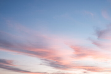 Beautiful nature view cirrus cloudy with soft sunrise in morning time, Cirrus clouds turned pink by the setting sun