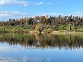 Fototapeta premium Late autumn atmosphere on the Swiss Katzenseen lakes or Katzensee lakes (Katzen lakes), Regensdorf - Lenzerheide - Canton of Zurich (Zürich or Zuerich), Switzerland (Schweiz)