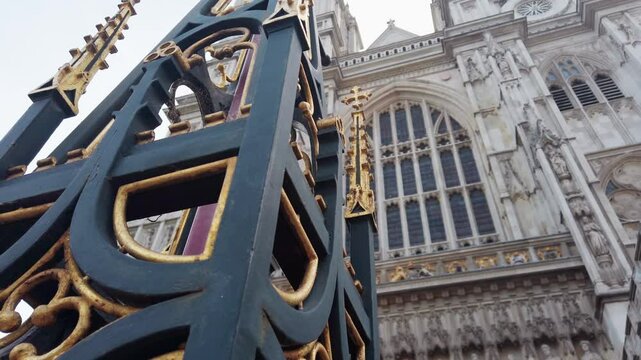 Ornate fence and architectural details of Westminster Abbey church in London