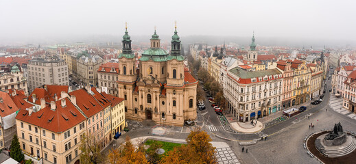 Obraz premium Great panoramic view of the city of Prague, a UNESCO World Heritage Site on a foggy day. Czechia.