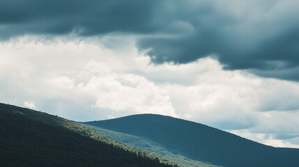 Obraz premium Dramatic Mountain Landscape Under Stormy Skies: Nature's Moody Grandeur