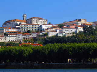 Coimbra, Portugal. Cityscape and Skyline of the city. On top there’s the University of Coimbra, below Old Coimbra and on bottom the Mondego River.