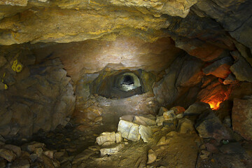 Mining tunnel with colorful streaks of rock