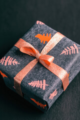 Fototapeta premium Dark Gray Gift Box with Coral Ribbon