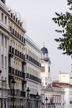 Puerta del Sol city square with Real Casa de Correos clock tower in central Madrid