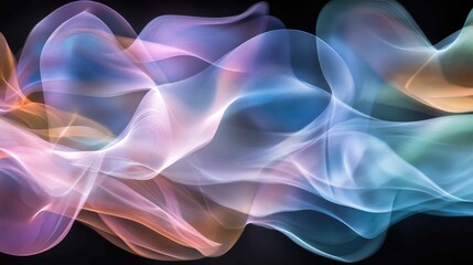 Obraz premium Soft pastel-colored light trails flowing through the air, blending softly against a black background