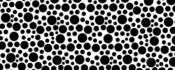 Black circles of various sizes on a white background. Seamless vector pattern.