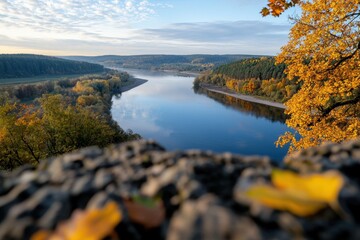 Naklejka premium A beautiful view of a river with a reflection of the trees and the sky