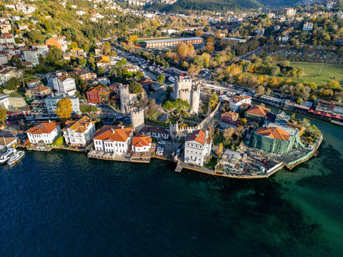 Aerial view of the historic Anadolu Fortress by the Bosphorus with beautiful coastal landscape and greenery, Anadolu Hisari, Turkey.