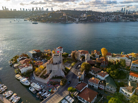 Aerial view of the beautiful Anadolu Fortress and Bosphorus River with scenic skyline and boats, Istanbul, Turkey.