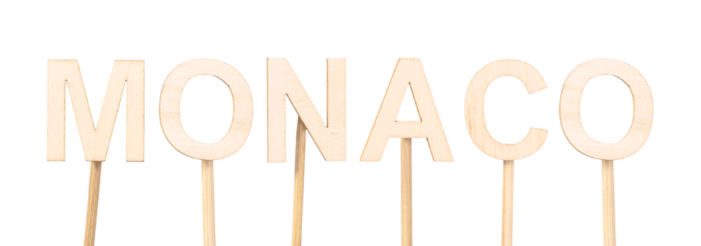 Decorative elements: wooden letters forming the word Monaco.