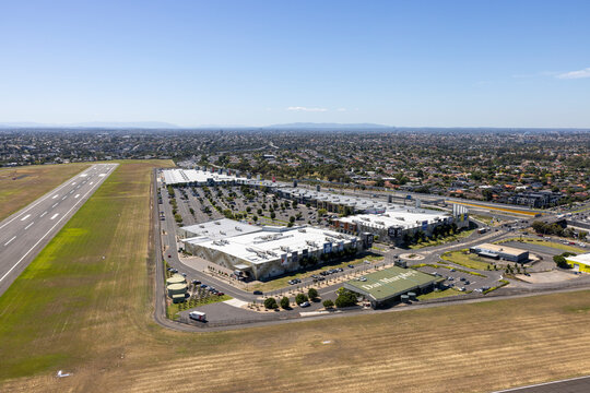 Aerial view of essendon fields airport with modern buildings and expansive runway, melbourne, victoria, australia.