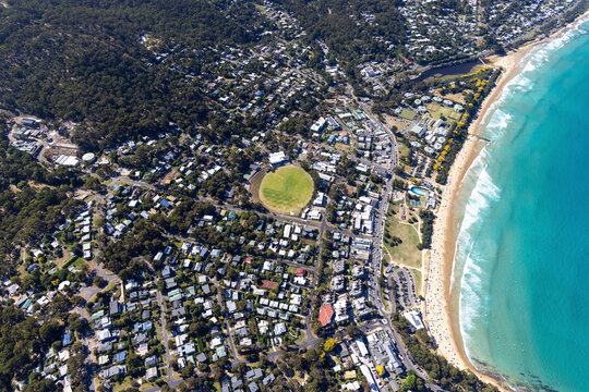 Aerial view of beautiful coastal town of Lorne with beach and ocean waves, Victoria, Australia.