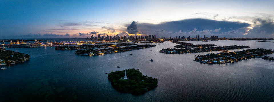 Aerial view of beautiful Biscayne Bay with Monment Island and Miami Beach skyline at sunset, Florida, USA.