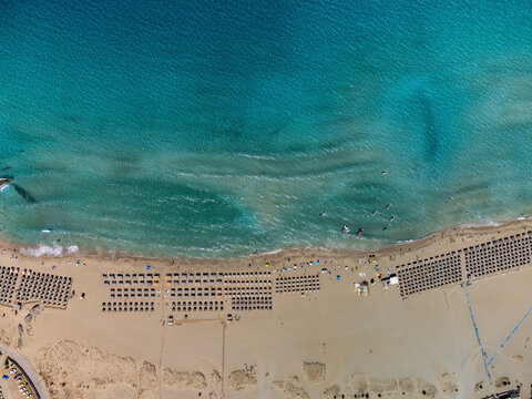 Aerial view of balos beach with turquoise water and sandy shore, Platanos, Greece.