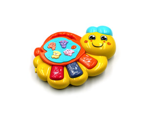 Obraz premium Children's musical toy piano on a white background 