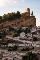 Panoramic view of Montefrio since National Geographic lookout with olive trees in the foreground at sunset. Granada, Andalucia, Spain.
