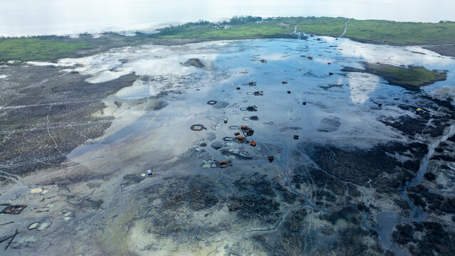 Aerial view of oil spillage affecting the landscape and water, Degema, Nigeria.