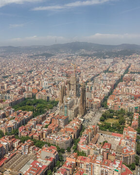 Aerial view of the beautiful Sagrada Familia and historic skyline, Eixample, Barcelona, Spain.