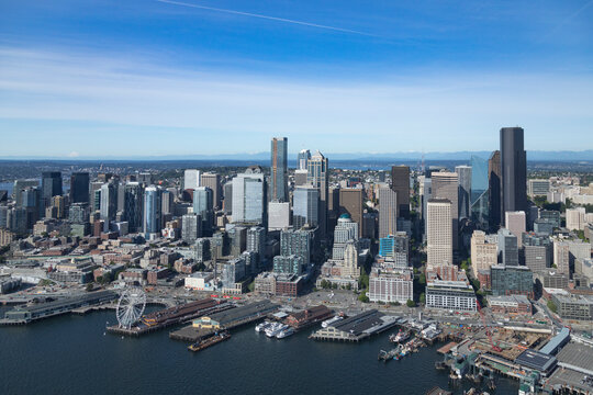Aerial view of beautiful skyline with highrise buildings overlooking Elliot Bay and Puget Sound, Downtown Seattle, United States.