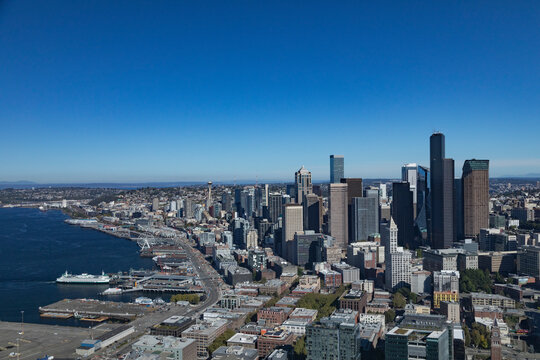 Aerial view of the beautiful skyline and waterfront of Seattle with Elliot Bay and Puget Sound, Washington, United States.