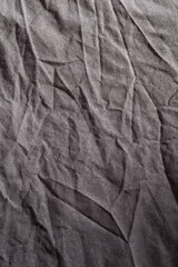 Fototapeta premium ARRIÈRE-PLAN DE TISSU GRIS FROISSÉ