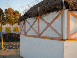 Closed kiosk on the seashore. Business went bust. Concept of bankruptcy of a kiosk on the sea.