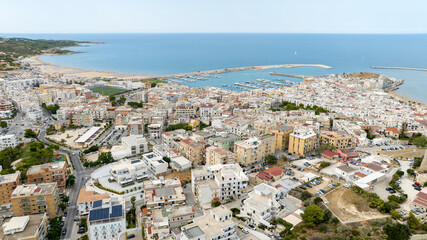 Aerial view of the tourist port of Vieste, in the province of Foggia, Puglia, Italy. It is a small...