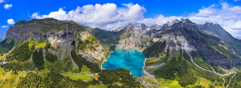 Oeschinensee Switzerland lake aerial panorama with turquoise water and snowy Alps high resolution 16K World Print wide angle scenery near Kandersteg for large scale wall art interior decor