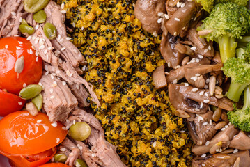 Quinoa bowl with tofu, steamed vegetables, grains, seeds and spices