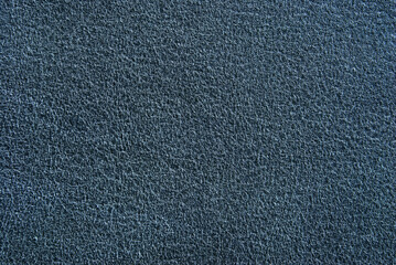 Dark blue fine leather texture pattern as background