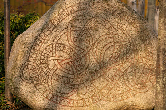 rune stone with Midgard serpent in Trelleborg Sweden, viking runes	