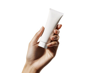 a hand holding a white tube