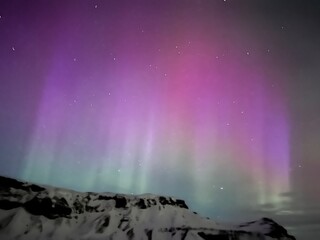 aurora borealis over the mountains