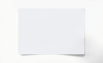Blank white sheet of paper on white background.