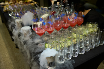 An elegant and stunning Champagne Tower adorned with a mysterious and enchanting smoke effect