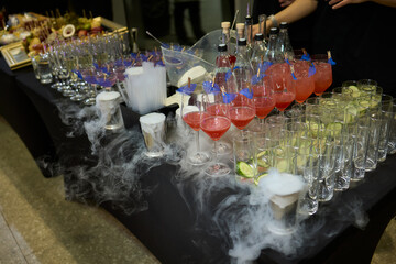 An elegant and stunning Champagne Tower adorned with a mysterious and enchanting smoke effect