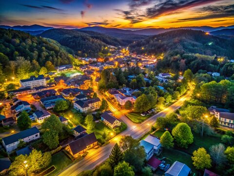 Aerial Night Drone Photography of Elkin, North Carolina: Enchanting Trees and Idyllic Rural Homes Illuminated Under the Stars on a Spring Evening