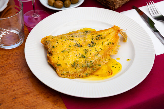 Lenguado meuniere in lemon sauce closeup. French cuisine