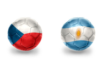 Obraz premium football balls with national flags of czech republic and argentina ,soccer teams. on the white background.