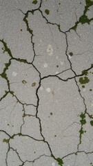Obraz premium Rough and weathered stone surface texture with cracks and moss, outdoor, surface