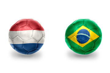 Obraz premium football balls with national flags of netherlands and brazil ,soccer teams. on the white background.