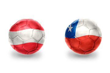 football balls with national flags of austria and chile ,soccer teams. on the white background.